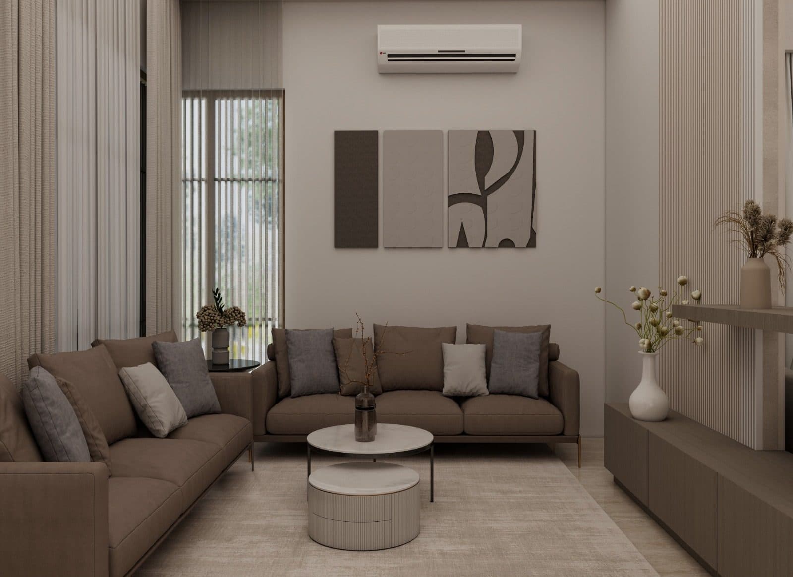 Family sitting room with two taupe sofas below a triptych of relief panels