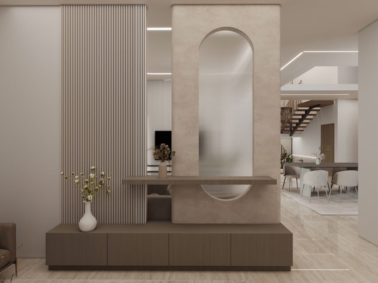Console below an arched panel of reeded glass, looking through to the dining table and stair