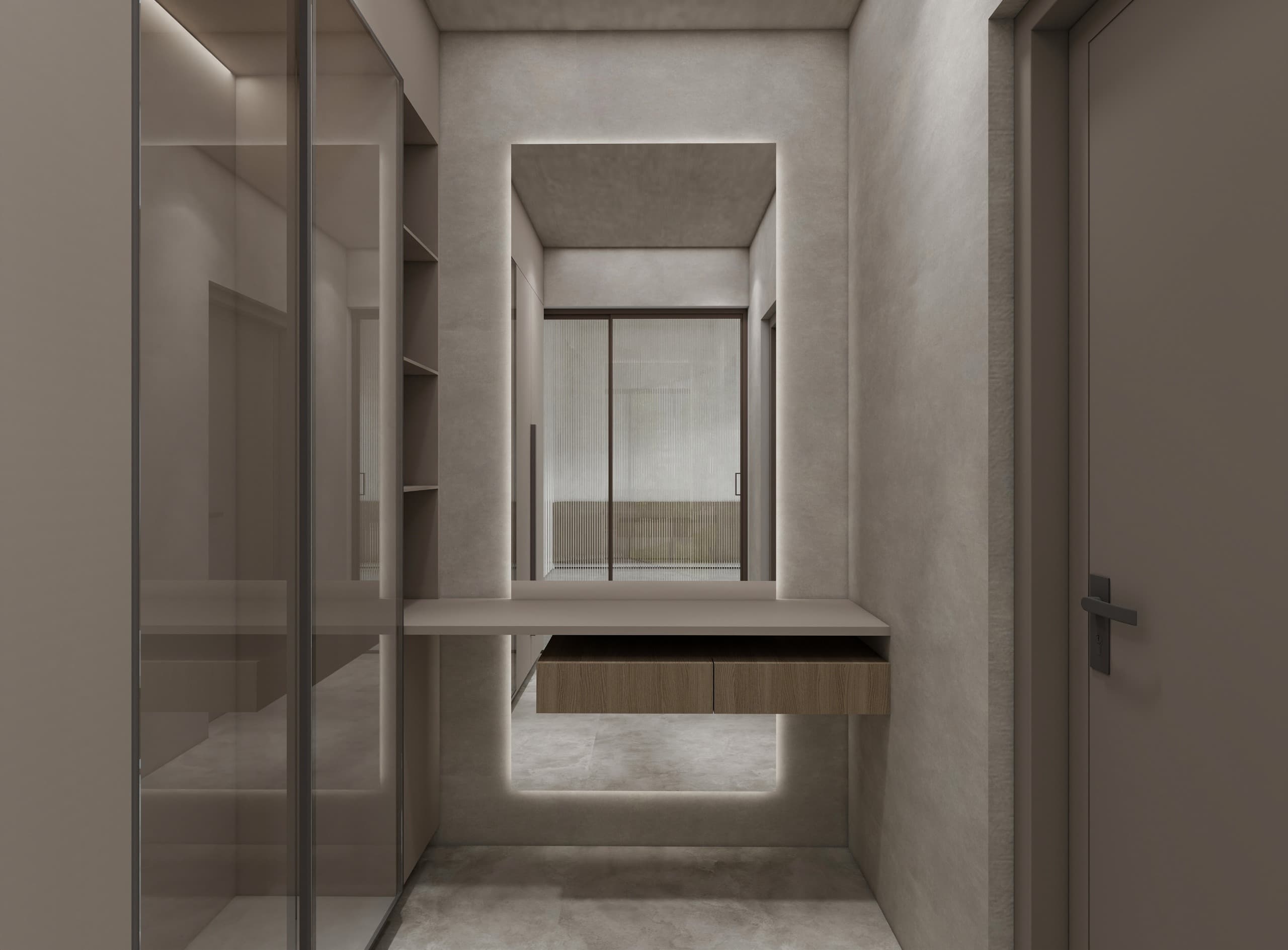 Dressing area with a backlit mirror recess above a floating oak drawer, looking through to a reeded glass screen
