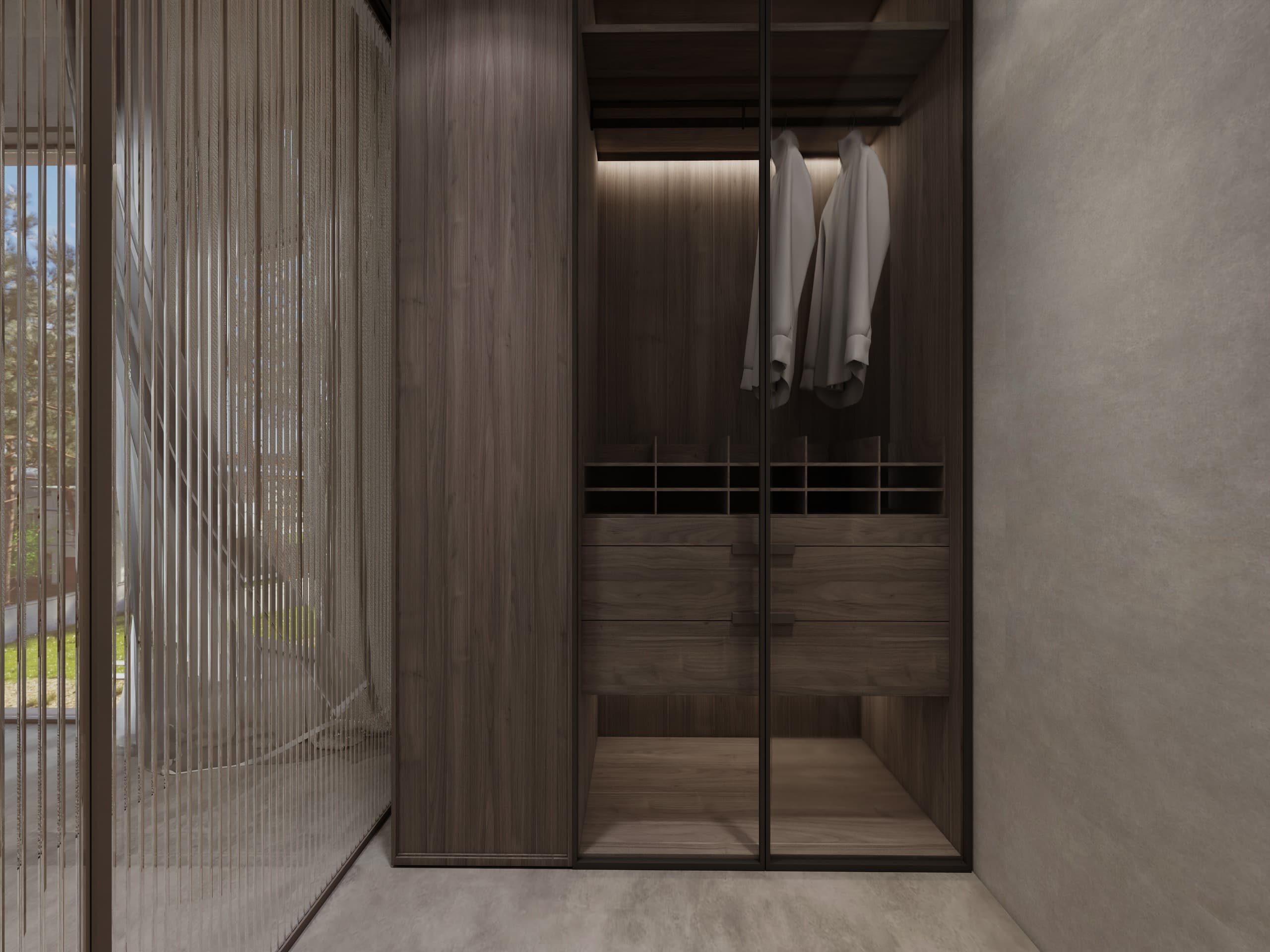 Walk-in wardrobe in dark timber behind framed glass doors, alongside a reeded glass screen onto the garden