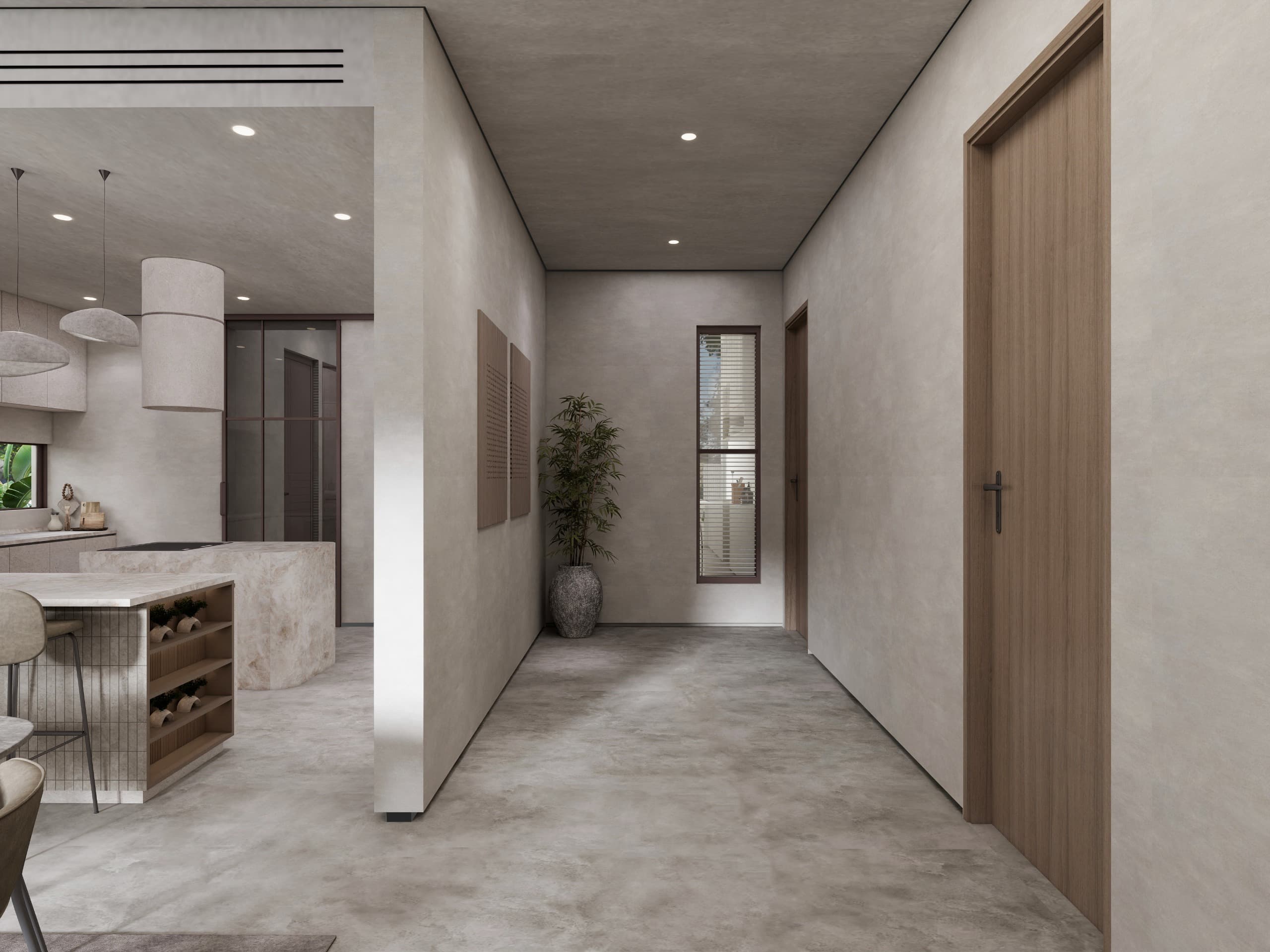 Corridor in poured concrete running past the kitchen island, lined with tall timber doors and closed by a slot window