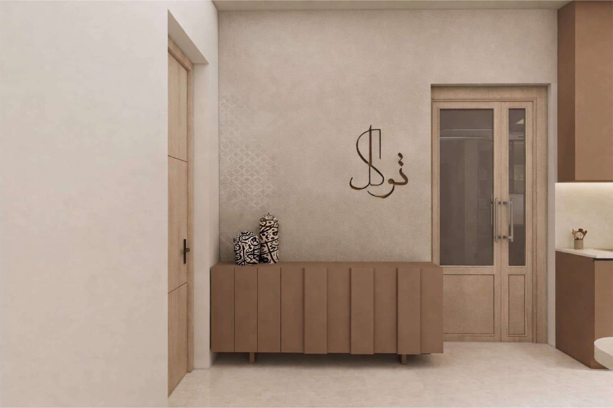 Entrance hall with a fluted console, Arabic calligraphy wall piece and a glazed timber door through to the kitchen